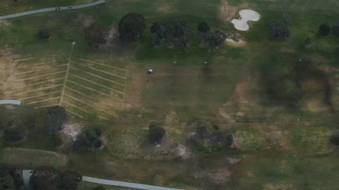 Aerial top down view of a golf course with players Video stock 342572618