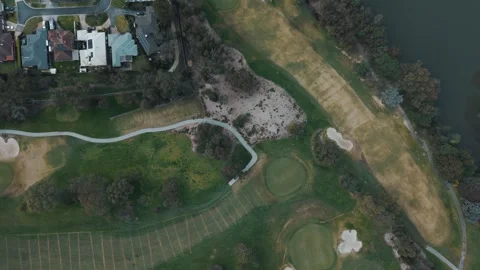Aerial top down view of golf course fairways and greens Video stock 342575382