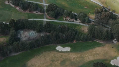 Aerial top-down view of a golf course fairway Video stock 342577824