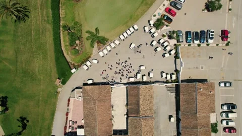 Aerial top down view of Golfers preparing to play in El Paraiso Golf Stock Footage 233196416