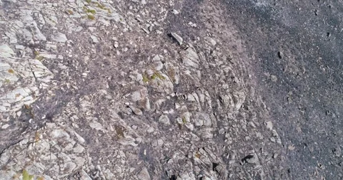 Aerial Top Down View of Granite Rocky Mountain The Concept of Rugged Terrain Stock Footage 323859980