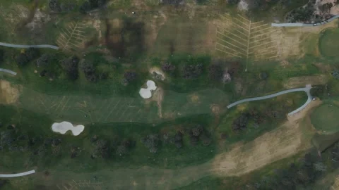 Aerial top down view of a green golf course Video stock 342574946
