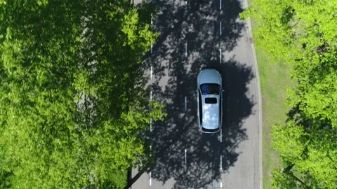 Aerial top down view of grey station wagon vehicle overtaking drone camera 4k 스톡 동영상 141942266