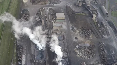 Aerial top down view heavy industry zone showing area and exhaust smoke 4k Stock Footage 58406736