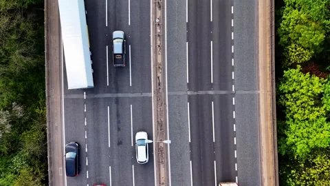 Aerial Top Down View of HGV Truck Changing Lanes on M6 Motorway UK — Cars and Stock Footage 334125251