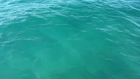 Aerial top down view from high altitude of blue azure turquoise sea water Stock Footage 228905142