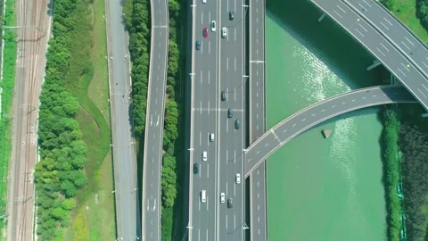 Aerial top down view of a highway overpass multilevel junction with fast moving Stock-Footage 166209728