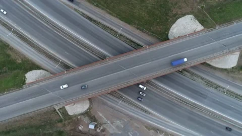 Aerial top down view of highway interchange junction road with traffic. Shot Video stock 170136889