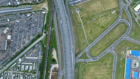 Aerial top down view of highway interchange junction road with traffic. Stockbeeldmateriaal 201103284