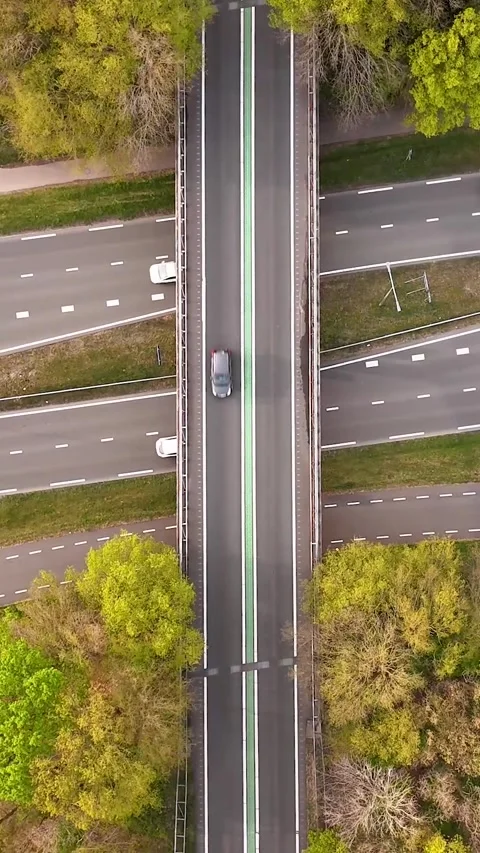 Aerial top-down view of highway overpass traffic Видео 327114265