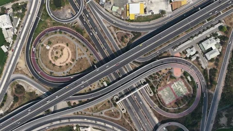Aerial top down view of highway interchange and traffic Stock-Footage 329224723