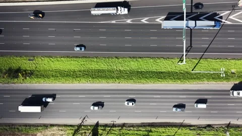 Aerial top down view of highway traffic driving Stock-Footage 341919514