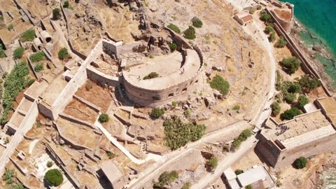 Aerial top down view of historic Spinalonga fortress ruins in Crete Stock Footage 337046731