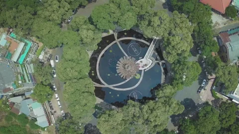 Aerial top-down view of ho chi minh city turtle lake roundabout Stock Footage 329488088