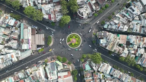 Aerial Top Down View of Ho Chi Minh City, Vietnam Roundabout Traffic Stock Footage 335574999