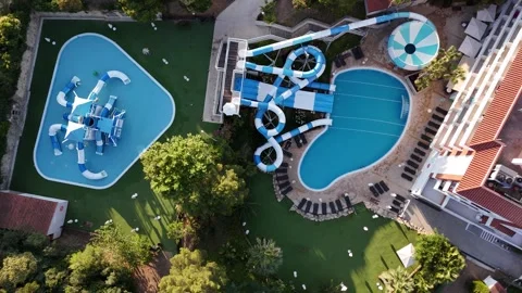 Aerial Top Down View of Hotel Pool and Water Slides in Spain Stockbeeldmateriaal 341293075