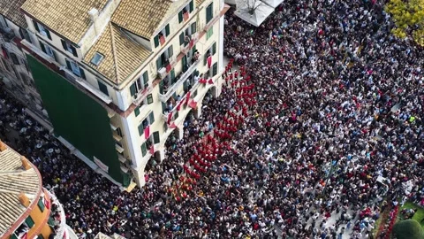 Aerial Top Down View of Huge Crowd and Easter Marching Band in Corfu Greece Stockbeeldmateriaal 333819776