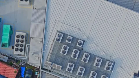 Aerial top-down view of hvac systems on an industrial roof Stock Footage 340568225