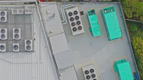 Aerial top-down view of hvac systems on a building rooftop Stock Footage 340595011