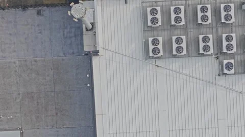 Aerial top-down view of hvac units on a building roof Stock Footage 340603864