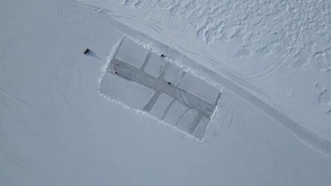 Aerial Top-Down View of Ice Skating Rink on Frozen Lake Stock Footage 280412237