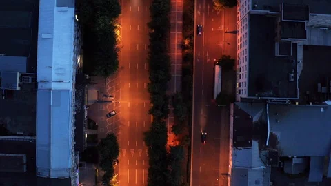 Aerial top down view of illuminated city road at night with car traffic, drone Stock-Footage 112795624