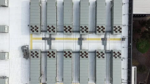 Aerial top down view of industrial cooling systems on a rooftop Video stock 340503302