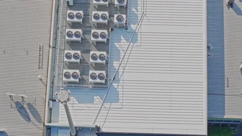 Aerial top down view of industrial building with air conditioners Stock Footage 340569702