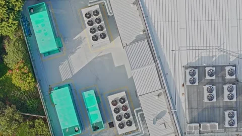Aerial top down view of industrial building rooftop ventilation system Stock Footage 340594248