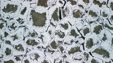 Aerial top down view of interlocking ice chunks in Lake Ontario Stock Photos