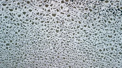 Aerial top down view of interlocking ice chunks in Lake Ontario Stock Photos