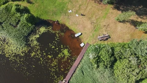 Aerial Top Down View of the lake pier boat zoom. Stock Footage 169870850
