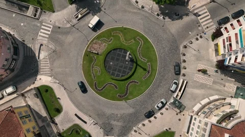 Aerial Top-Down View of a Landscaped Traffic Circle in Coimbra Stock-Footage 345840329