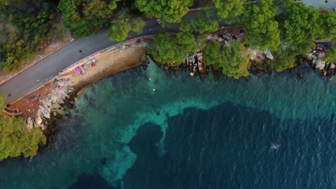 Aerial top down view of lanterna beach on hvar island croatia Stockbeeldmateriaal 339777796