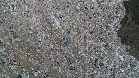 Aerial top down view of large garbage landfill, trash dump. Flocks of birds 스톡 동영상 234892874
