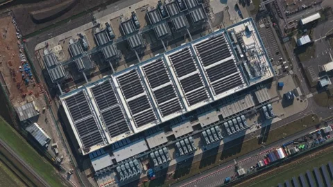 Aerial top down view of a large modern datacenter building exterior Stock Footage 334057037