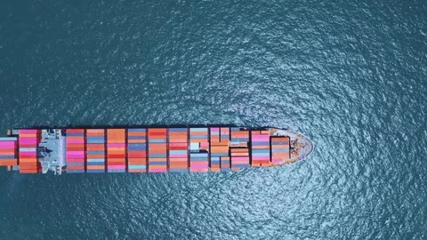 Aerial top down view large container cargo ship traveling with slow speed over Stock Footage 336448465