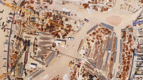 Aerial top-down view of a large building construction site Vídeos de archivo 337729174