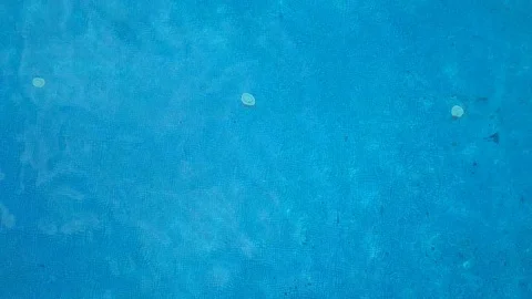 Aerial. Top down view of light blue water in the pool Stock Footage 77434824