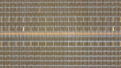 Aerial top down view of lighten up greenhouse also called a glasshouse 4k Stock Footage 168124499