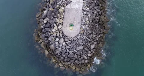 Aerial Top Down View of a Lighthouse Ascending The Concept of Perspective Stock-Footage 327814557