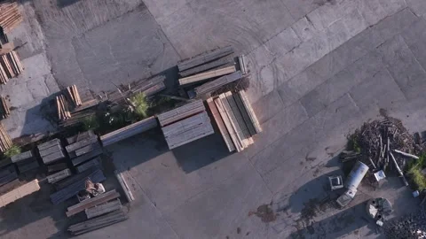 Aerial top-down view of lumber stacks at a woodworking factory Stock Footage 346393496