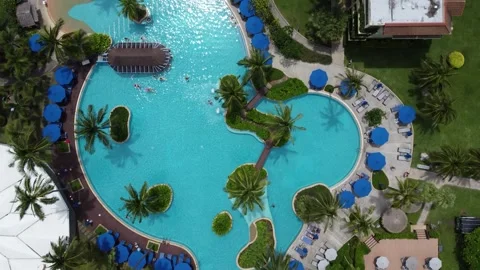 Aerial top down view of luxurious hotel swimming pool 4k Stock Footage 270943874