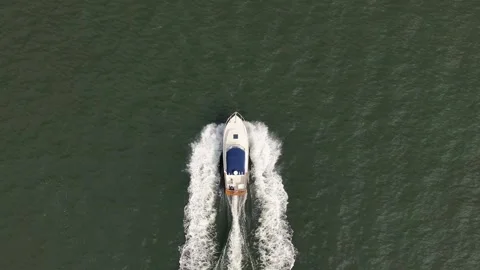 Aerial Top Down View Of Luxury Motor Boat Racing On The Water Stock Footage 246822644