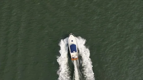 Aerial Top Down View Of Luxury Motor Boat Racing On The Water Stock Footage 246822645