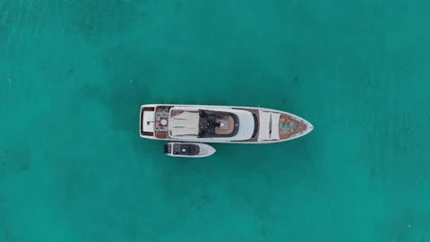 Aerial Top Down View of Luxury Yacht in Turquoise Bahamas Ocean Water Stock Footage 335910658