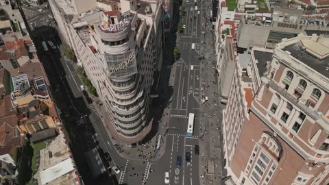 Aerial top down view of Madrid Gran Via buildings architecture and cars driving Stock Footage 254805693