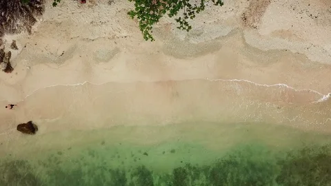 Aerial top down view on a man on a beach in Thailand Stock-Footage 88142045