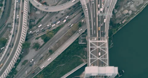Aerial top down view of Manhattan highway in New York at pink sunset. Wide to Lo Stock Footage 199457540