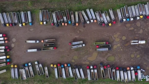 Aerial top down view to many parked trucks near to wheat depot in Burgas 스톡 동영상 320180063